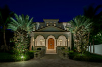 Twilight Mediterranean Estate Entry with Palms Photography | Jupiter, FL