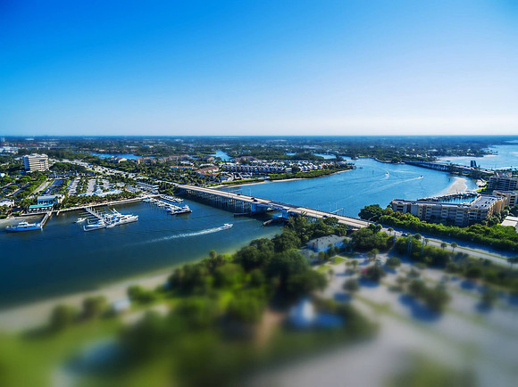 Tilt-Shift Aerial View of a Marina and Bridge in South Florida