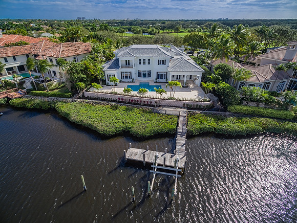Aerial View of a Waterfront Estate with Pool and Private Dock in South Florida