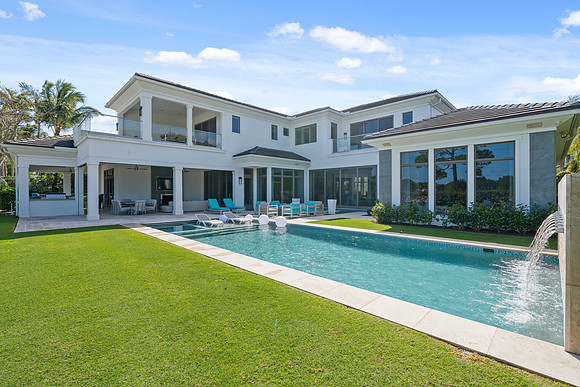 White Two-Story Home with Wraparound Porch and Pool Photography | Jupiter, FL