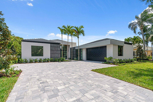 Modern Home Front Exterior with Paver Driveway Photography | Jupiter, FL