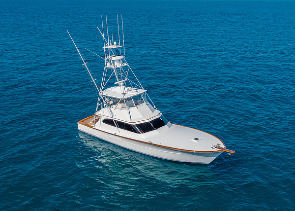 Top-Down Aerial View of a Sportfishing Yacht on Open Ocean Water