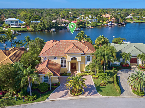 Aerial View of a Waterfront Home on a Canal in South Florida