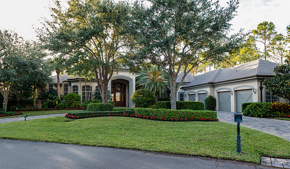 Traditional Home Exterior with Mature Oak Trees Photography | Jupiter, FL