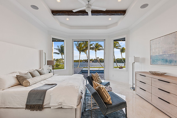 Coastal Bedroom with Ocean View and Wood Beam Ceiling Photography | Jupiter, FL