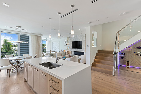 Open Concept Kitchen and Dining Interior with Staircase Photography | Jupiter, FL