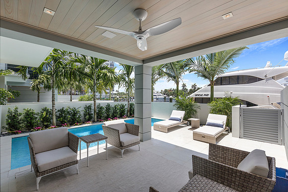 Covered Lanai with Pool and Waterway View Photography | Jupiter, FL
