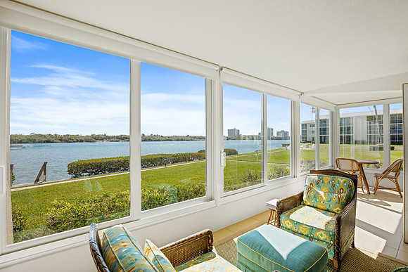 Enclosed Florida Sunroom with Waterway View Photography | Jupiter, FL