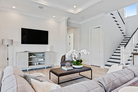 Bright Living Room Interior with Staircase Photography | Jupiter, FL