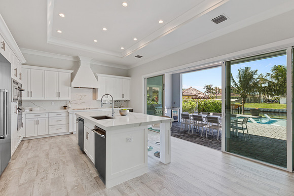 Kitchen with Indoor-Outdoor Living and Pool View Photography | Jupiter, FL