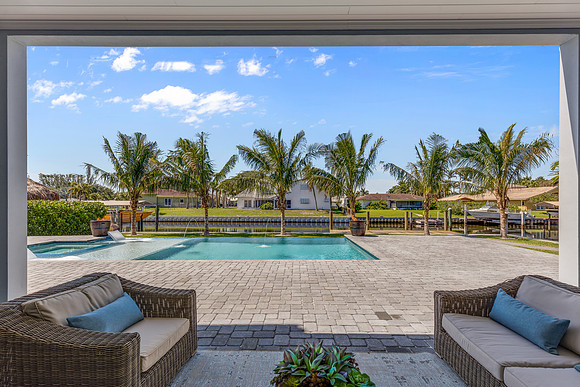 Covered Lanai with Community Pool View Photography | Jupiter, FL