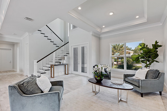 Formal Sitting Room with Floating Staircase Photography | Jupiter, FL