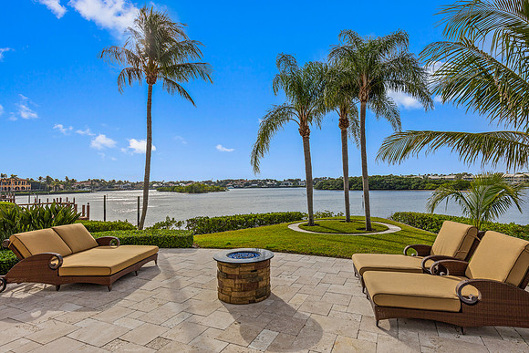 Waterfront Lawn with Lounge Chairs and Fire Pit Photography | Jupiter, FL