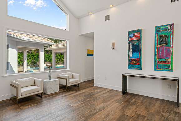 Interior Sitting Area with Colorful Art Display Photography | Jupiter, FL