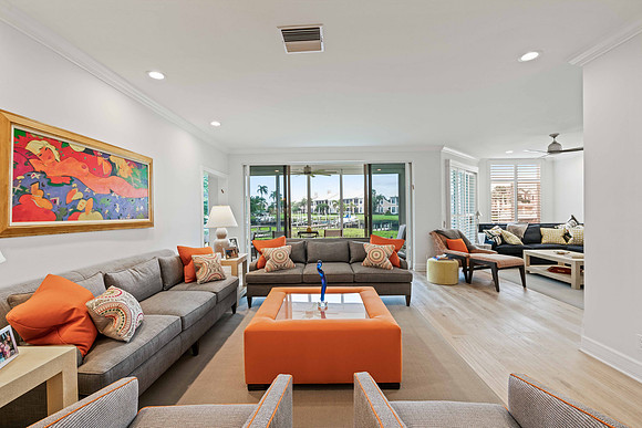 Living Room Interior Photography with Colorful Designer Art and Water View | Jupiter, FL
