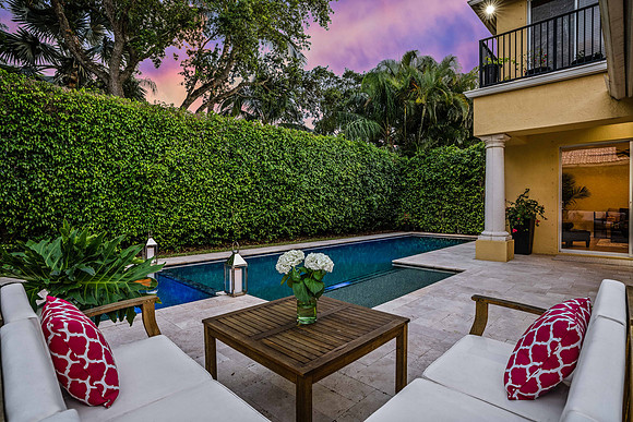 Twilight Private Courtyard Pool with Lounge Seating Photography | Jupiter, FL