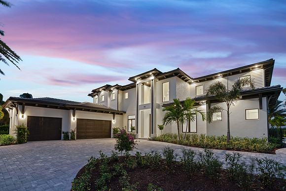 Twilight Front Exterior Photography of Luxury Home with Three-Car Garage | Jupiter, FL