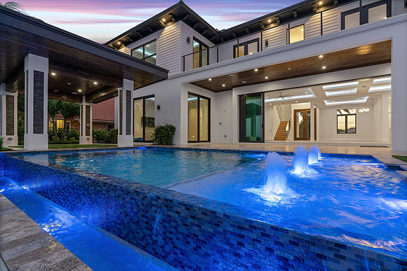Twilight Backyard Pool with Fountain Jets Photography | Jupiter, FL