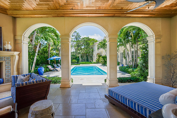 Covered Arched Loggia with Pool View Photography | Jupiter, FL