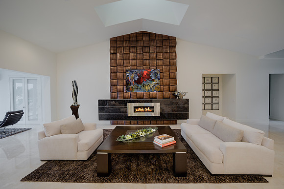 Modern Living Room with Wood Shingle Fireplace Feature Photography | Jupiter, FL