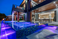 Twilight Real Estate Photography - Modern Luxury Home & Glowing Pool | Jupiter, FL