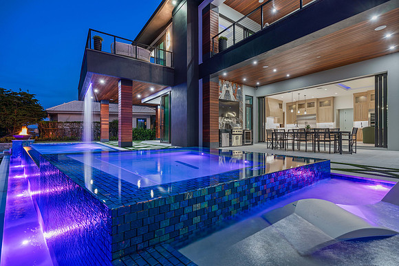 Twilight Real Estate Photography - Modern Luxury Home & Glowing Pool | Jupiter, FL