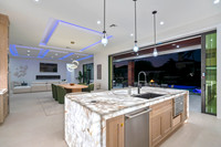 Modern Kitchen Twilight Interior Photography with Waterfall Marble Island | Jupiter, FL