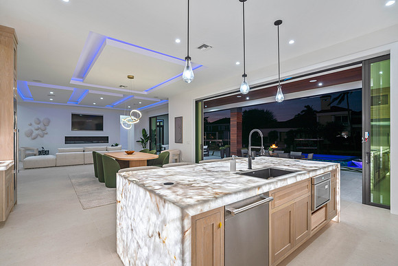 Modern Kitchen Twilight Interior Photography with Waterfall Marble Island | Jupiter, FL